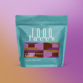 Savio coffee bag from 1000 Faces with turquoise pouch and geometric purple brown label.