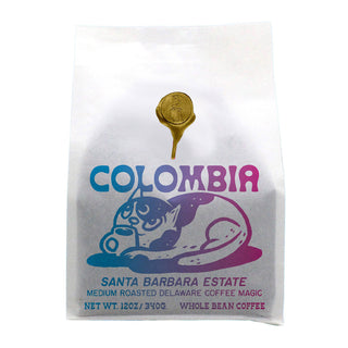 Colombia Santa Barbara Estate Washed coffee bag with gradient blue to purple branding and illustration