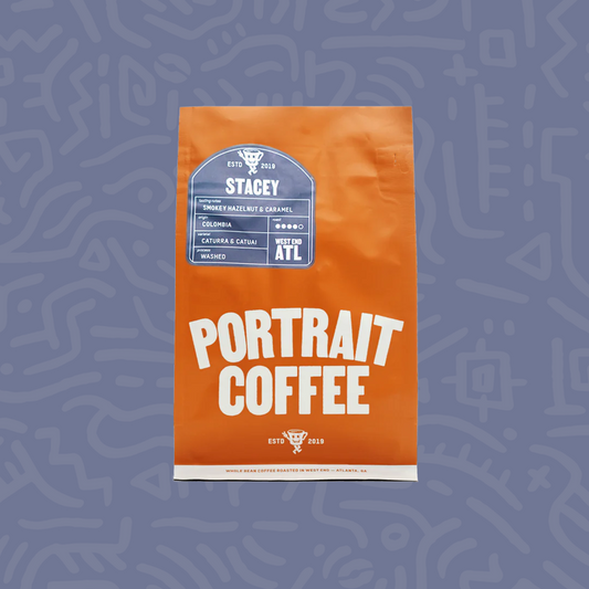Orange Stacey coffee bag from Portrait Coffee featuring a blue Stacey label and Colombia origin.