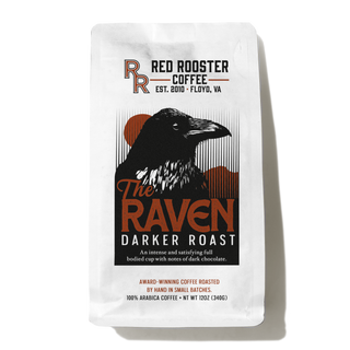 The Raven darker roast coffee packaging with a raven illustration