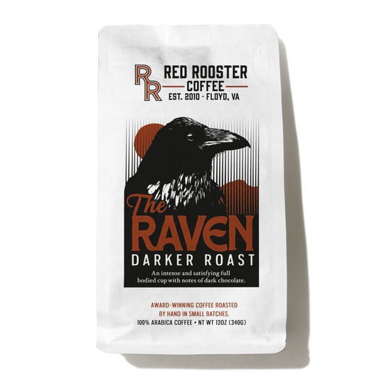 The Raven darker roast coffee packaging with a raven illustration
