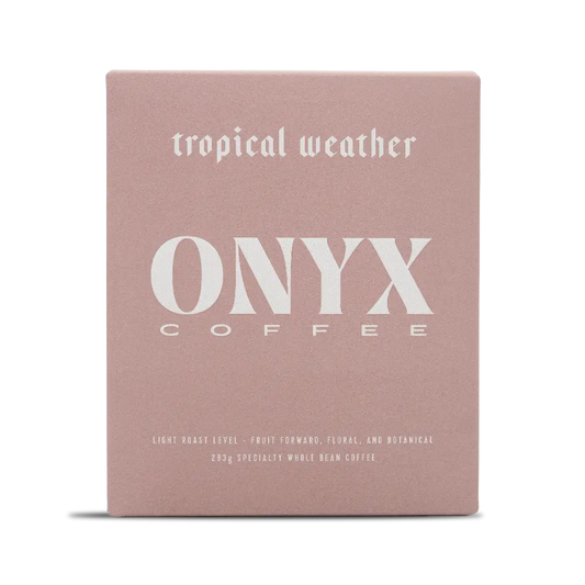 Tropical Weather Onyx Coffee Lab bag with pink packaging and large ONYX logo