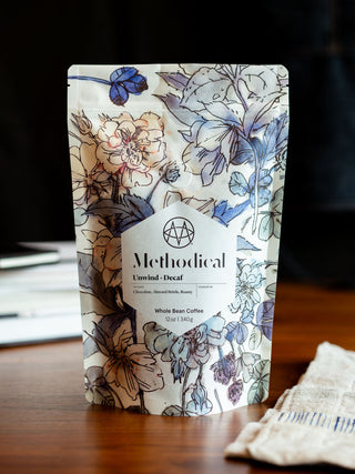 Methodical Unwind Decaf coffee bag with floral print