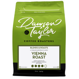 Vienna Roast coffee bag on green packaging with a white label card reading Vienna Roast