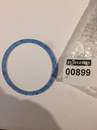 Blue circular La Spaziale S1 steam boiler gasket next to packaging labeled 00899