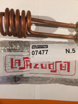 Coiled copper steam boiler element shown with La Spaziale packaging.