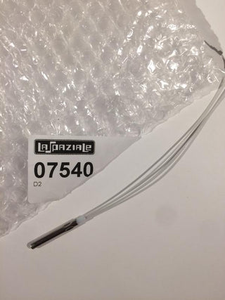 La Spaziale replacement temperature sensor labeled 07540 with white cable shown beside bubble wrap