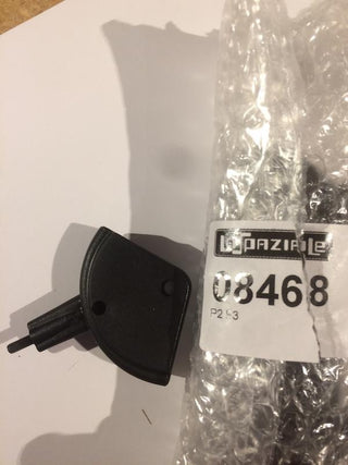 Steam lever for La Spaziale S1 shown next to packaging and bubble wrap
