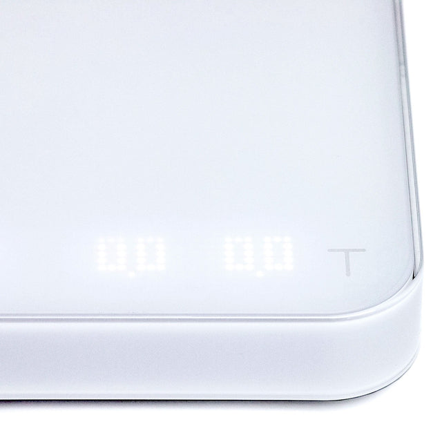 Acaia Pearl model S coffee scale in white closeup on LED dot matrix display, Clive Coffee - Knockout