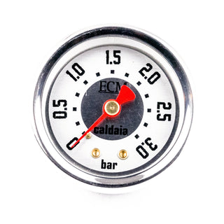 ECM steam boiler pressure gauge close up with dial and red needle