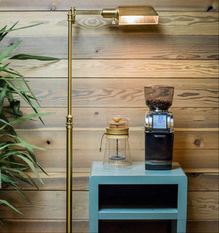 Baratza Forte BG Coffee Grinder on a table next to Hario french press, Clive Coffee - Lifestyle - Large