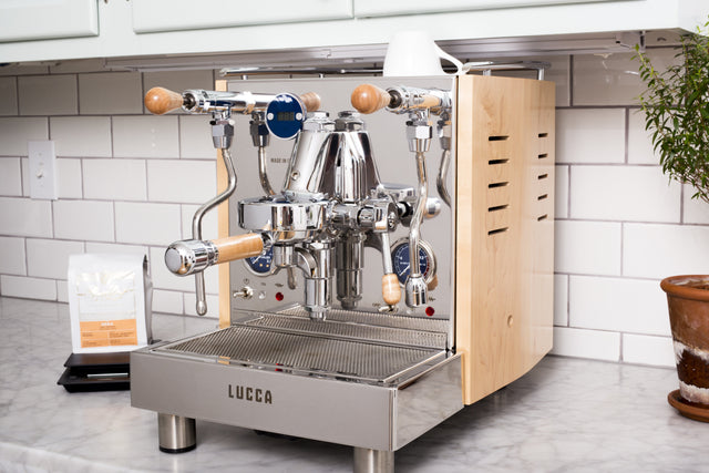 Clive Style 7 Wood Spouted Portafilter in maple on the Lucca M58 espresso machine, Clive Coffee - Lifestyle