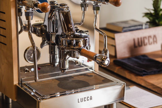 Clive Style 7 Wood Spouted Portafilter in walnut on the Lucca M58 espresso machine, Clive Coffee - Lifestyle
