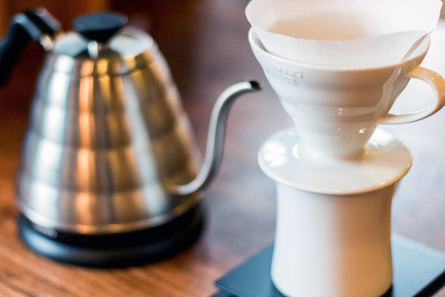 Hario V60 White Ceramic Coffee Dripper next to Hario Buono electric kettle, Clive Coffee - Lifestyle