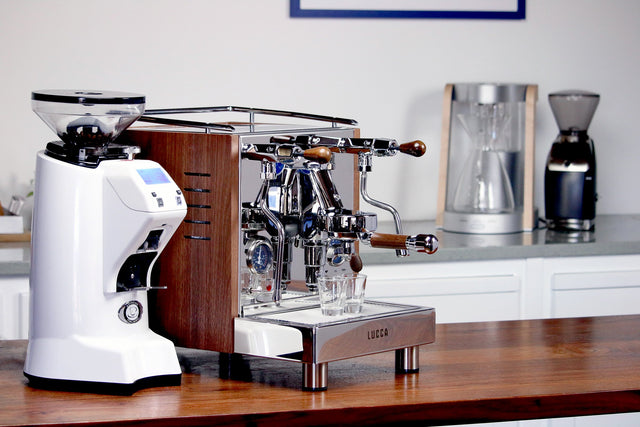LUCCA M58 espresso machine with Walnut Wood Panels from Clive Coffee alongside a Eureka Zenith grinder - Lifestyle