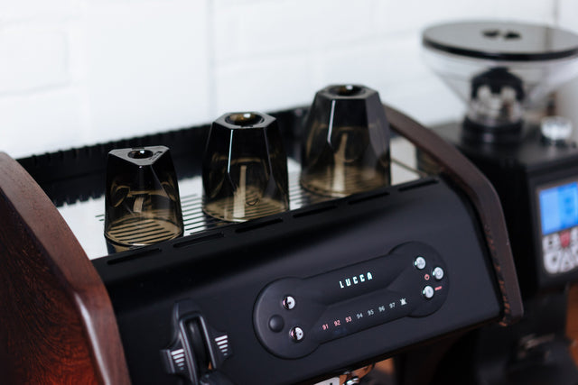 notNeutral Vero Cortado glass on top of a LUCCA A53 espresso machine, Clive Coffee - Lifestyle