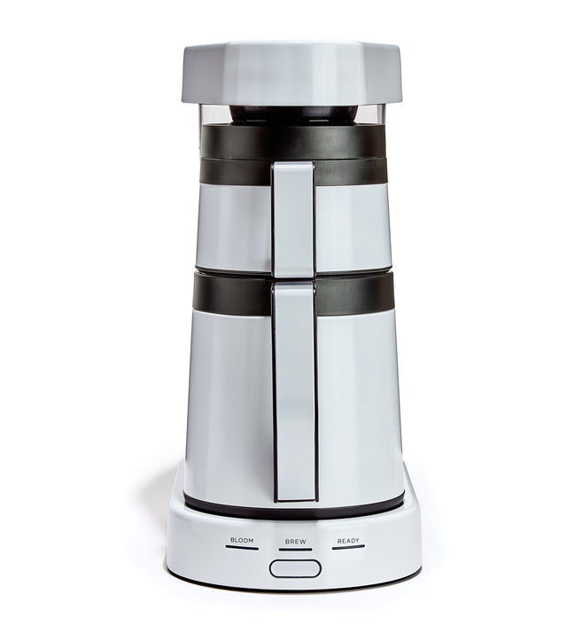 Side view of Ratio Six White coffee maker showing dual carafes and white lid